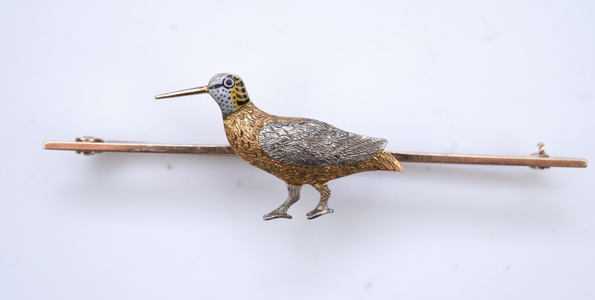 A gold and enamel brooch, circa 1900